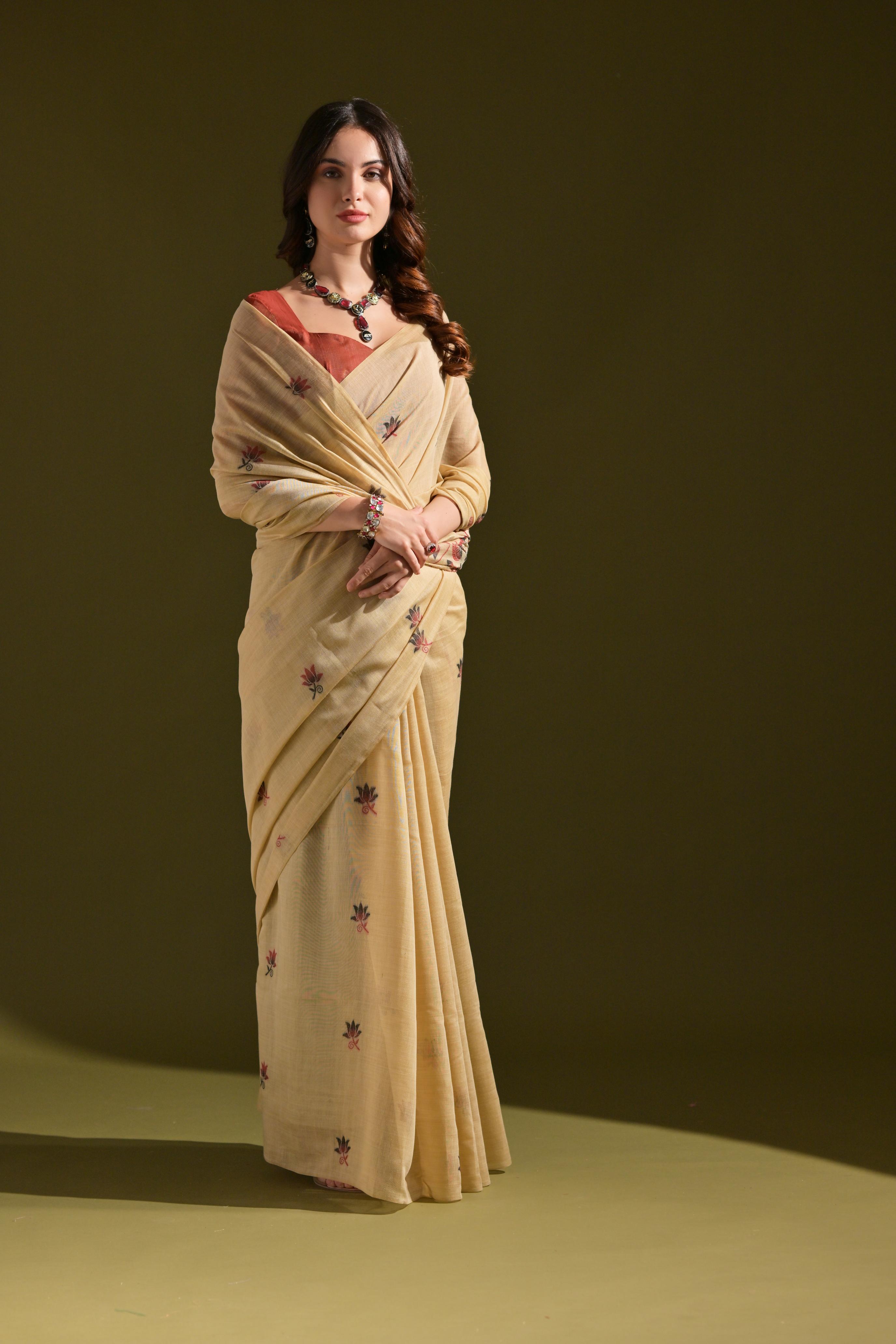 Noor- Muga cotton saree Temple Anarkali Gown is crafted with premium silk and traditional embroidery,