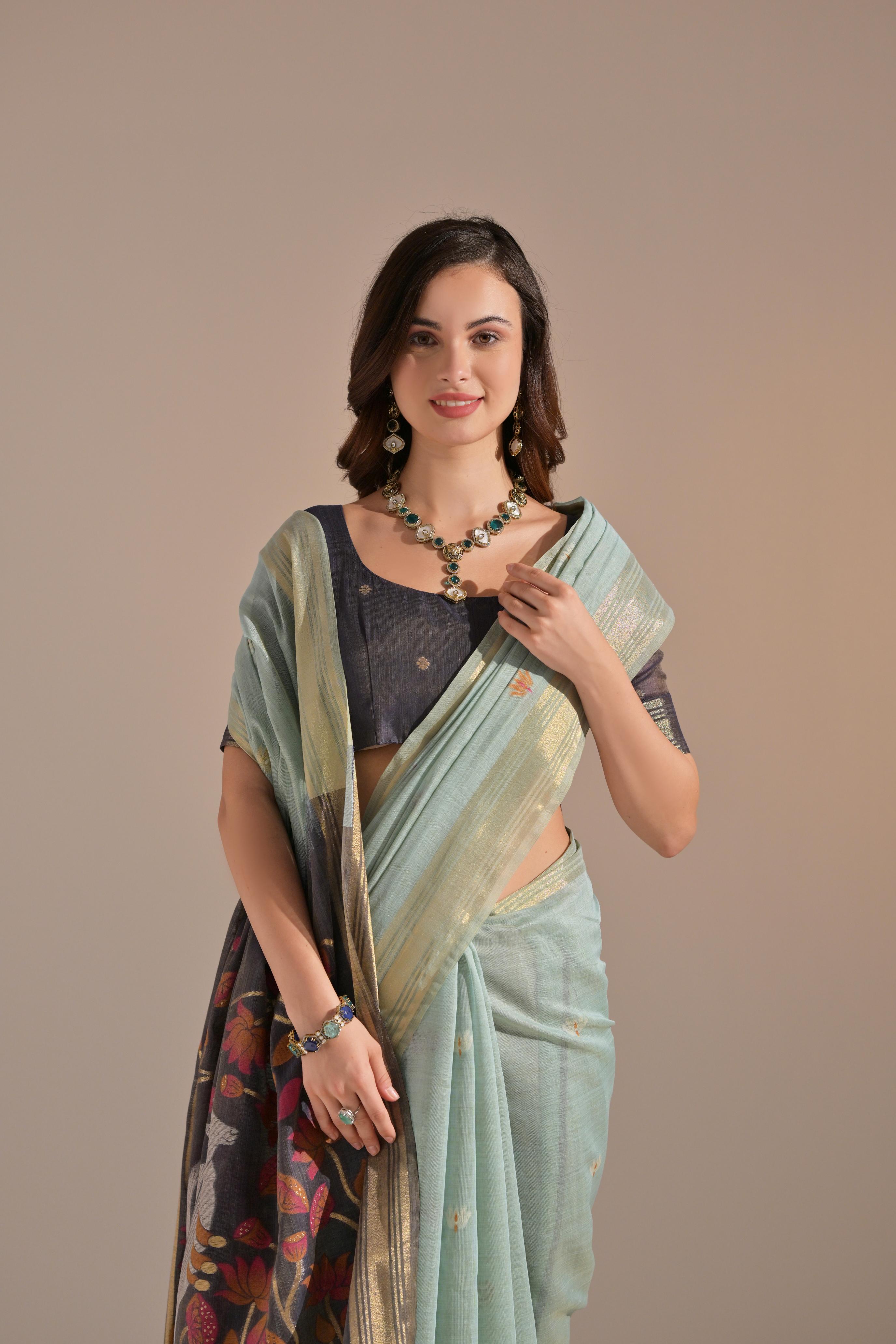 Bright-  motifs woven design saree with woven design border muga saree